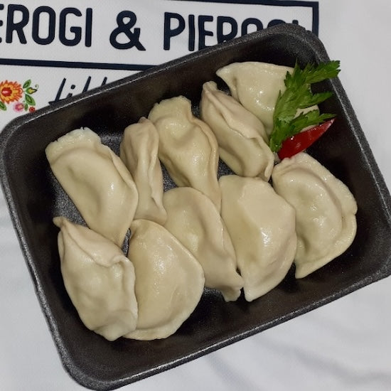 Pierogi z grzybami - håndlagde dumplings fylt med surkål og steinsopp
